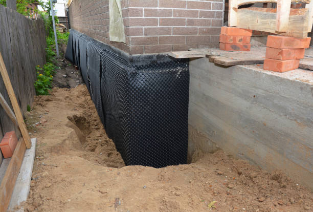 SJ Waterproofing Pros technician performing targeted Foundation Crack Repair assessment in Alexander, NY